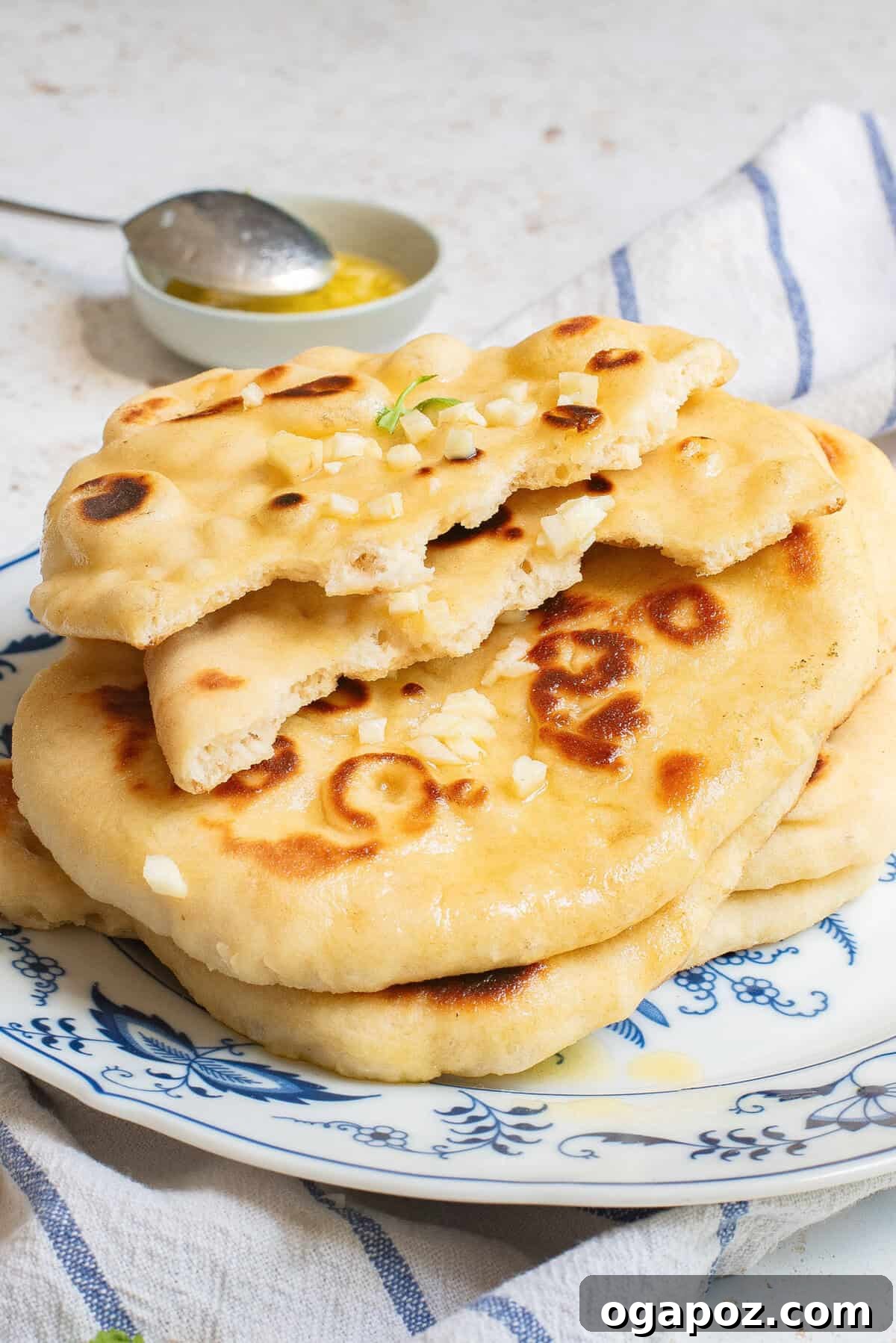 Foolproof Homemade Naan 3 Easy Homemade Naan piece with bite out of it
