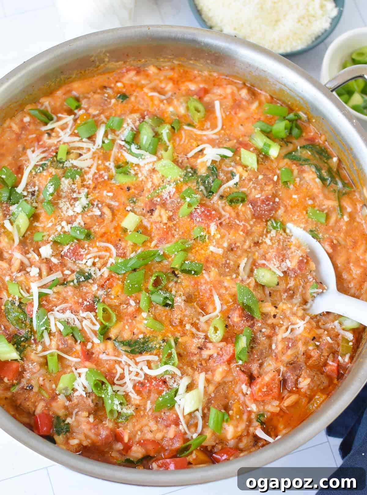 Spicy Creamy Cajun Sausage Rice Skillet 2 Creamy Cajun Sausage Rice Skillet in a skillet