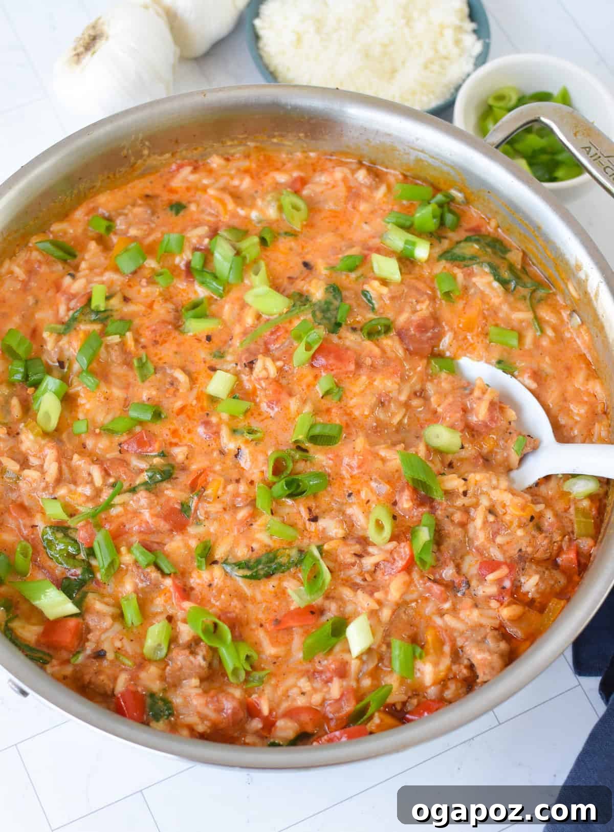 Spicy Creamy Cajun Sausage Rice Skillet 5 Creamy Cajun Sausage Rice Skillet with green onions