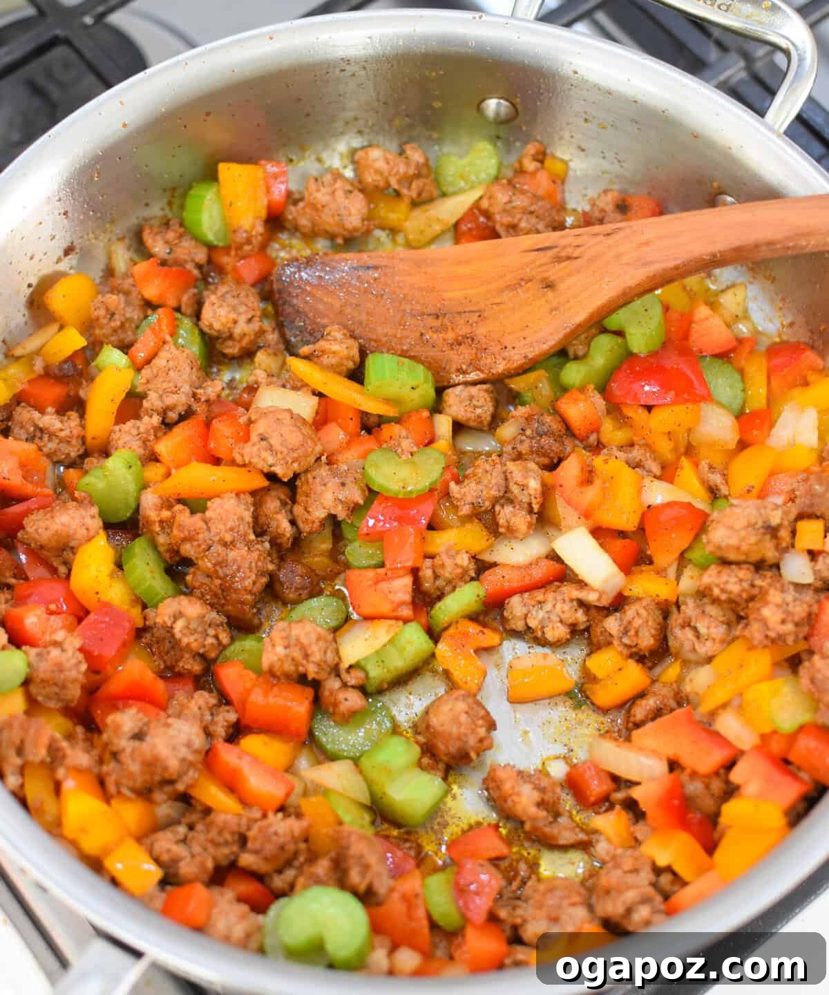 Spicy Creamy Cajun Sausage Rice Skillet 6 Creamy Cajun Sausage Rice Skillet sausage and vegetables in a skillet