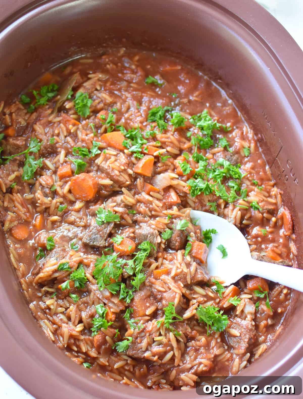 Hearty Greek Giouvetsi Beef Orzo Stew 8 Greek Beef Stew with Orzo simmering in a slow cooker
