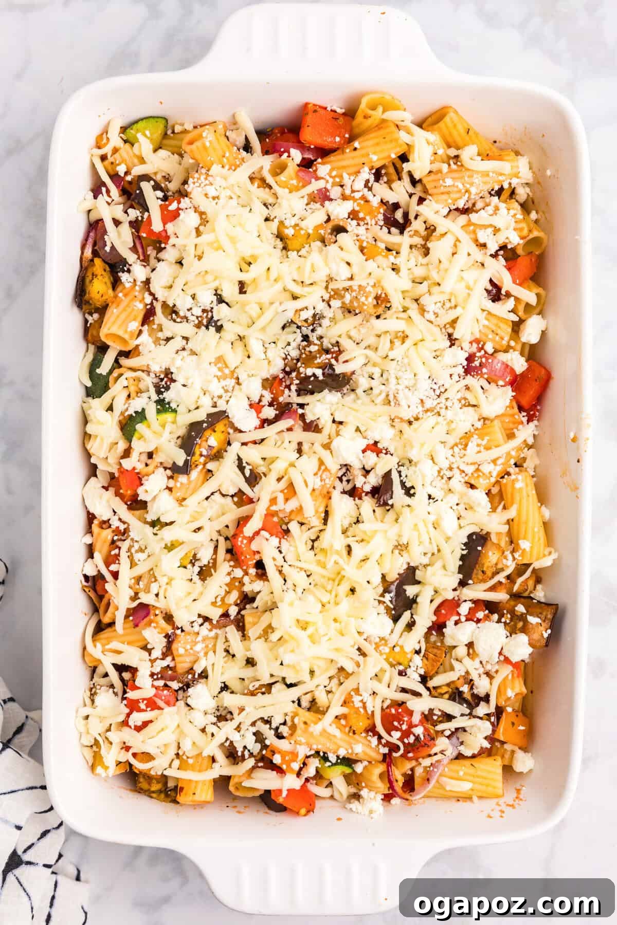 Golden Mediterranean Garden Pasta Bake 7 Mediterranean Roasted Vegetable Pasta Bake with cheese on top