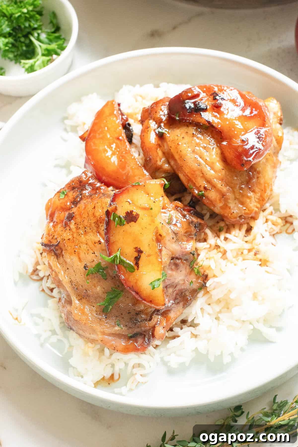 Cider-Glazed Skillet Chicken 3 Skillet Apple Cider Chicken served over white rice with fresh herbs