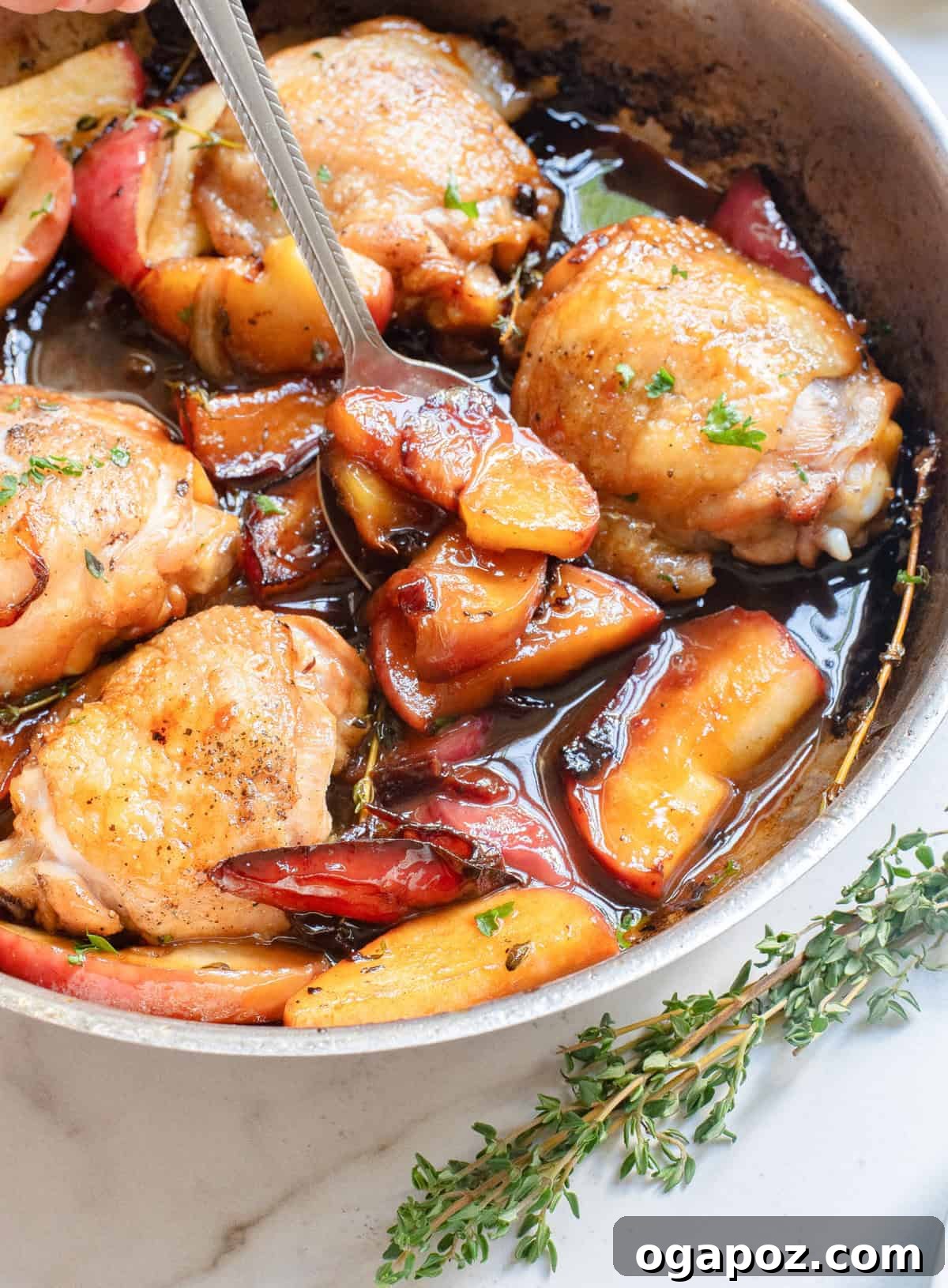 Cider-Glazed Skillet Chicken 7 Skillet Apple Cider Chicken ready to be served with a serving spoon