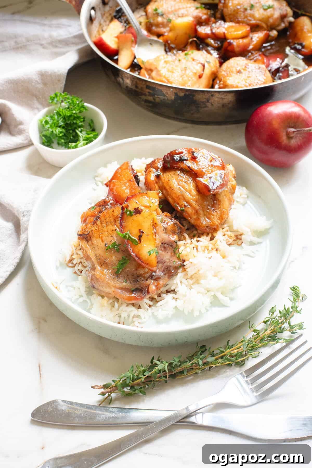 Cider-Glazed Skillet Chicken 9 Skillet Apple Cider Chicken served on a white plate