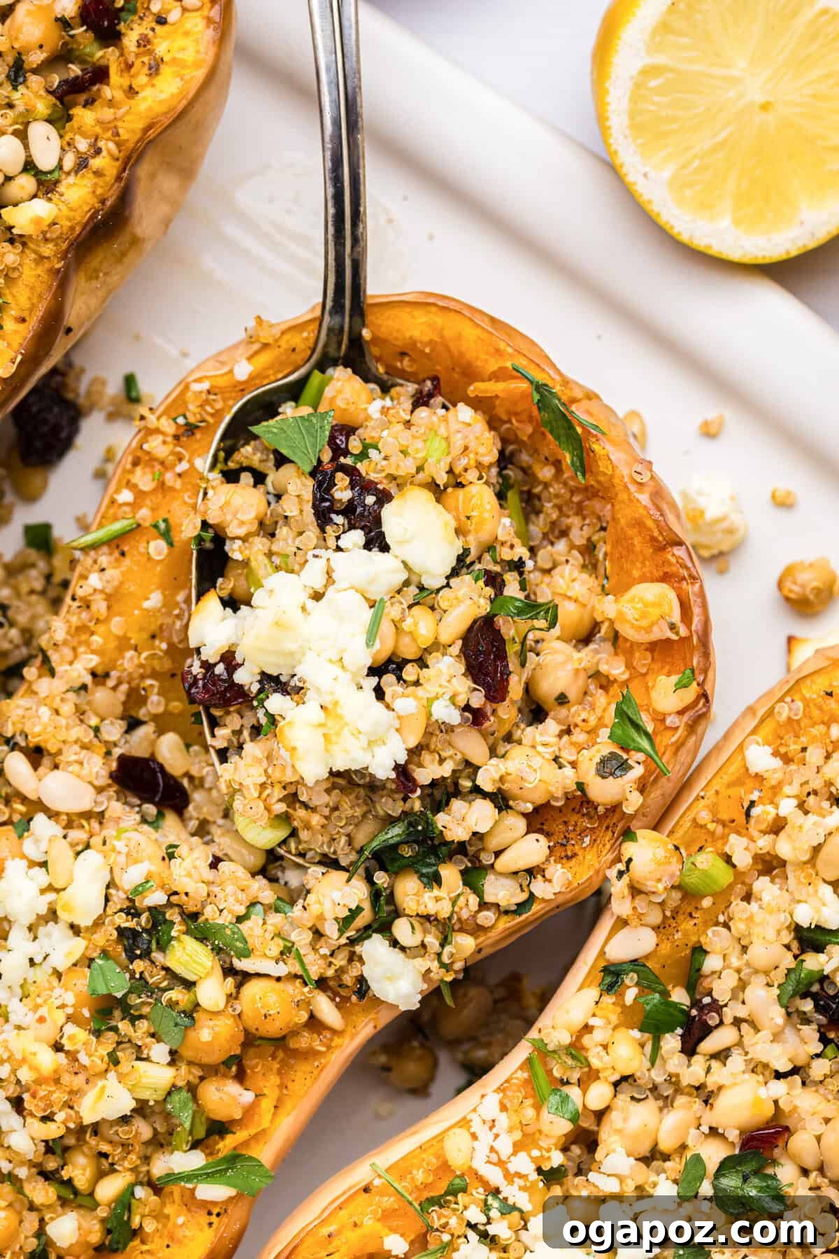 Flavorful Mediterranean Stuffed Butternut Squash Boats 3 Close-up of Mediterranean Stuffed Butternut Squash on a baking sheet, ready to serve