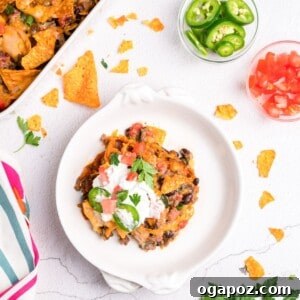 Doritos Taco Casserole in a baking dish, served in a bowl