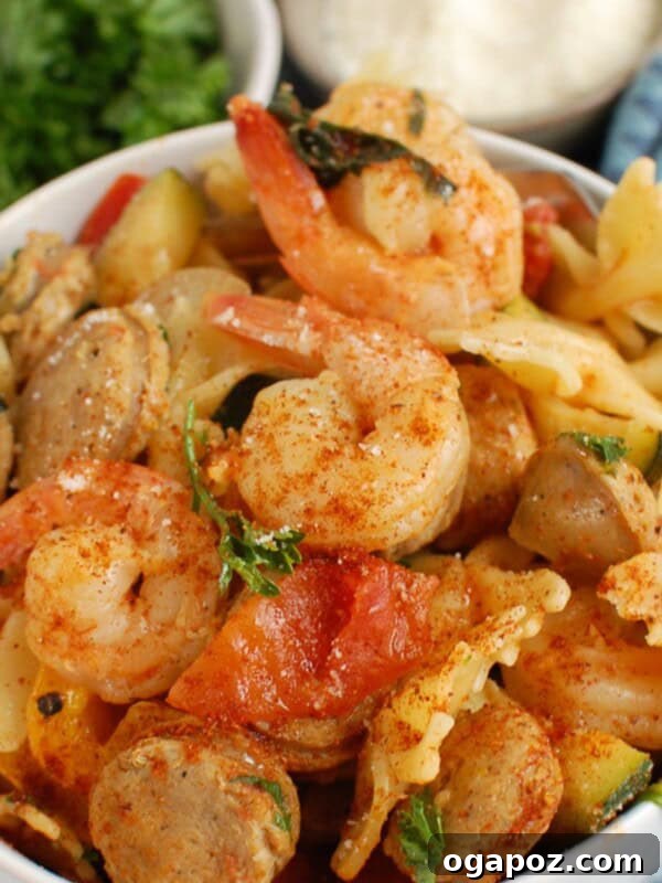 Creamy Chicken Tortellini Alfredo Perfection 9 Alfredo sauce simmering with Parmesan cheese.