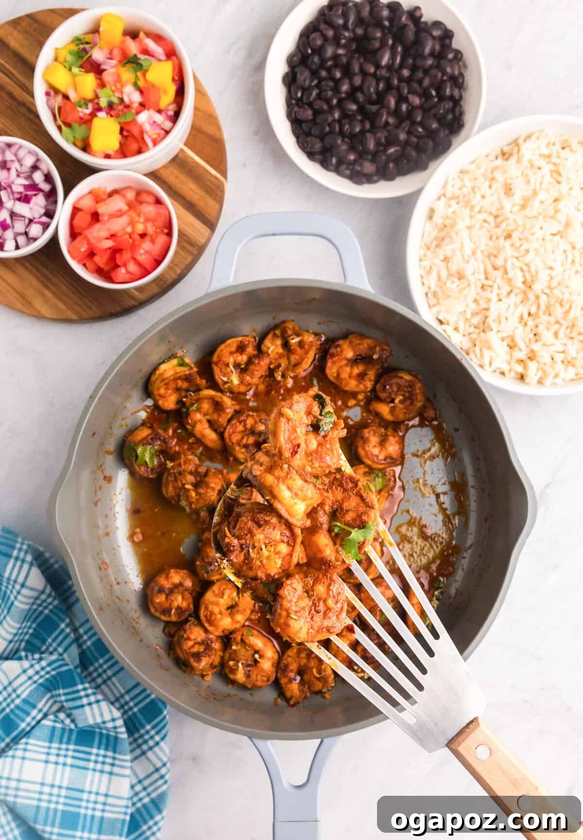 Sizzling Chili Prawns 10 Spicy Shrimp cooking in a hot skillet, perfectly searing.