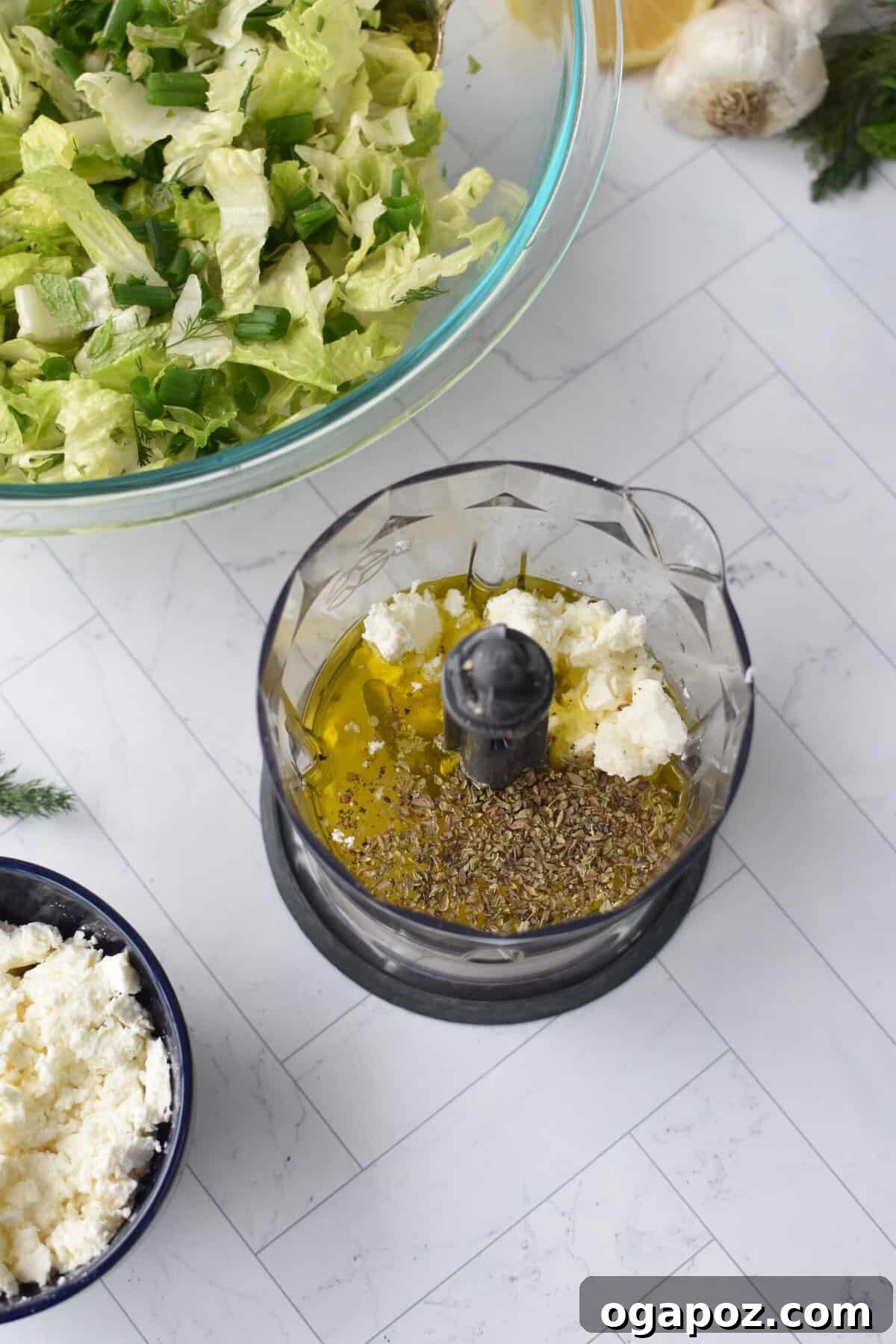 Vibrant Greek Lettuce and Dill Salad 9 Ingredients for Maroulosalata dressing, including olive oil, lemon, garlic, and feta