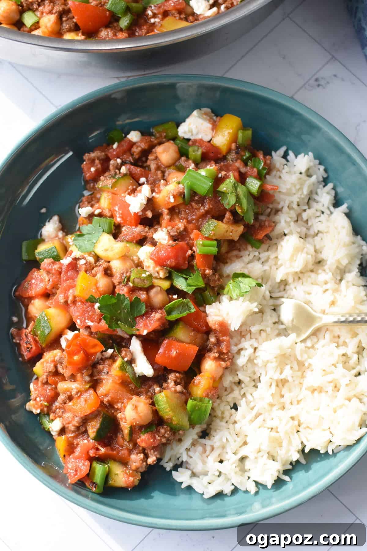 Vibrant Mediterranean Ground Beef Skillet 3 Mediterranean Ground Beef Skillet in a bowl with a fork
