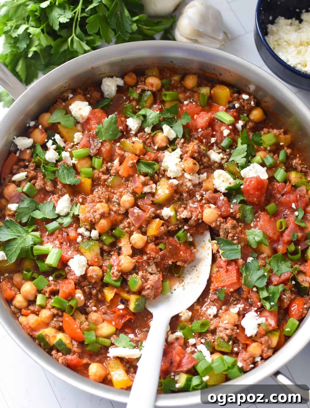 Vibrant Mediterranean Ground Beef Skillet 8 Mediterranean Ground Beef Skillet with a white spoon