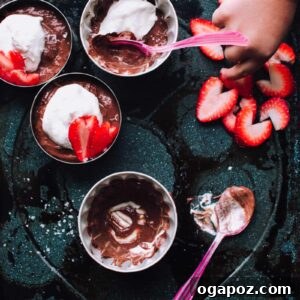 Double Chocolate Pudding garnished with whipped cream and chocolate shavings