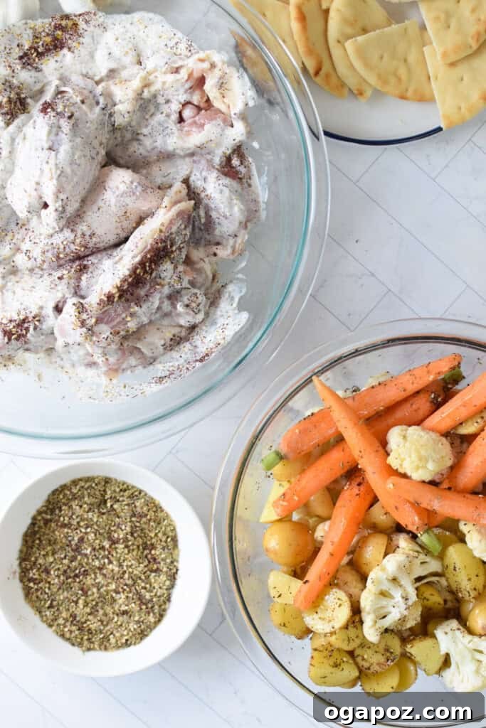 One Pan Roasted Zaatar Chicken 6 A selection of fresh ingredients laid out for Sheet Pan Za'atar Chicken.