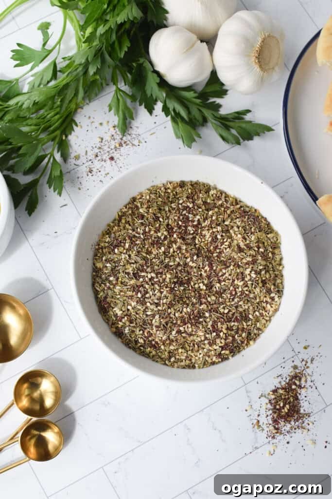 One Pan Roasted Zaatar Chicken 10 Close-up of za'atar spice mix ingredients in a bowl.