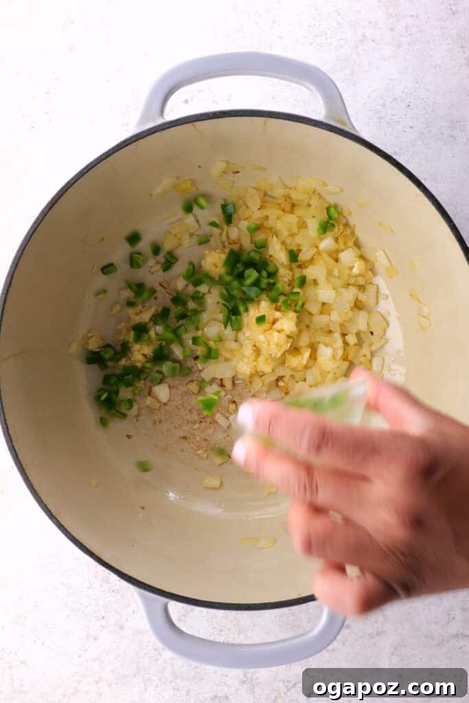 Rich and Flavorful Chili Con Carne 4 Step 1: Sautéing finely chopped onions in olive oil until they are deeply golden and caramelized.