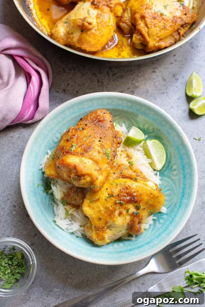 Golden Turmeric Chicken 7 Turmeric Chicken in blue bowl with limes
