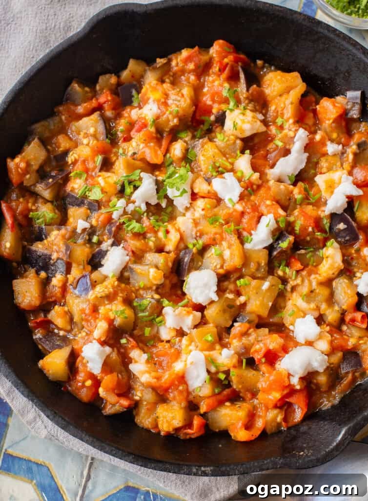 Rustic Skillet Tomato and Eggplant 4 Skillet Tomato and Eggplant topped with melted feta cheese