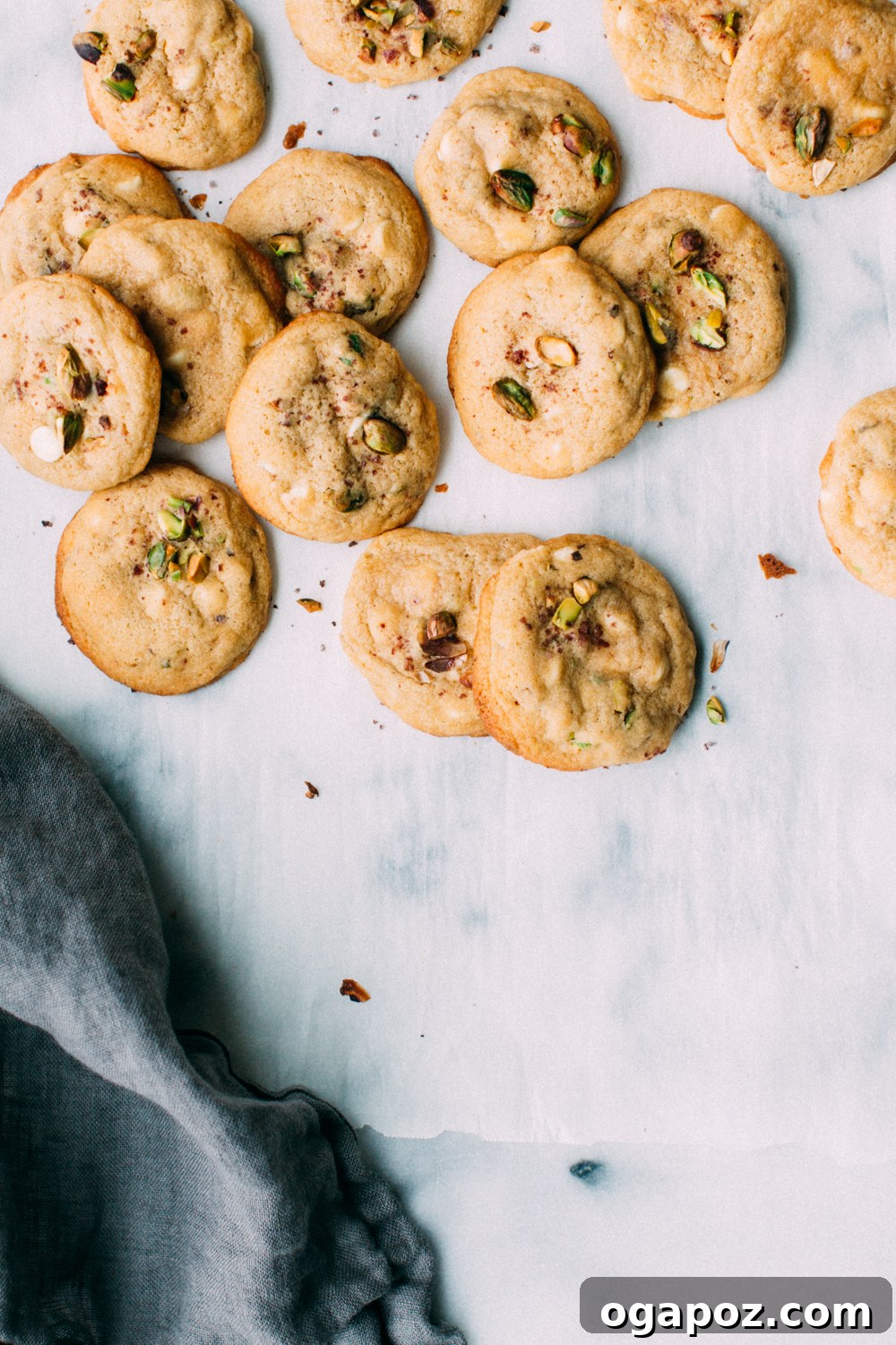 Lemony Pistachio White Chocolate Treasures 2 Freshly baked lemon pistachio white chocolate cookies on a cooling rack
