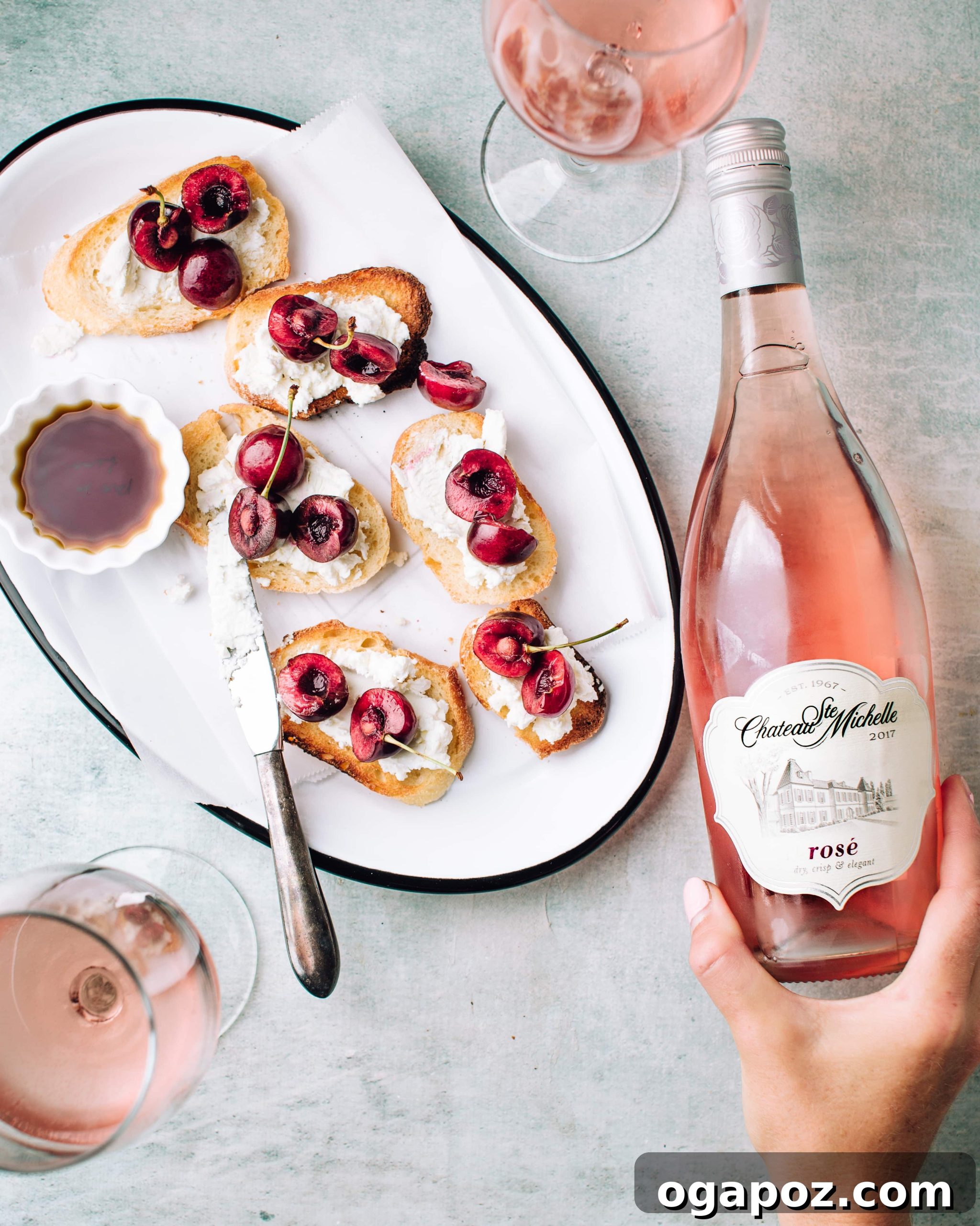 Irresistible Fall Appetizers Youll Love to Make 4 A bottle of Chateau Ste Michelle Rosé wine, poured into glasses, alongside a spread of delicious appetizers.