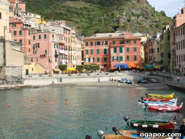 Cinque Terre, Italy - a picturesque coastal village scene with colorful houses and clear blue water