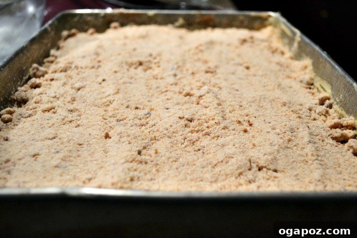 Freshly baked Cinnamon Swirl Coffee Cake cooling on a wire rack after being removed from the oven