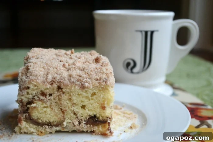 Full view of the delicious Cinnamon Swirl Coffee Cake on a serving platter, ready to be enjoyed