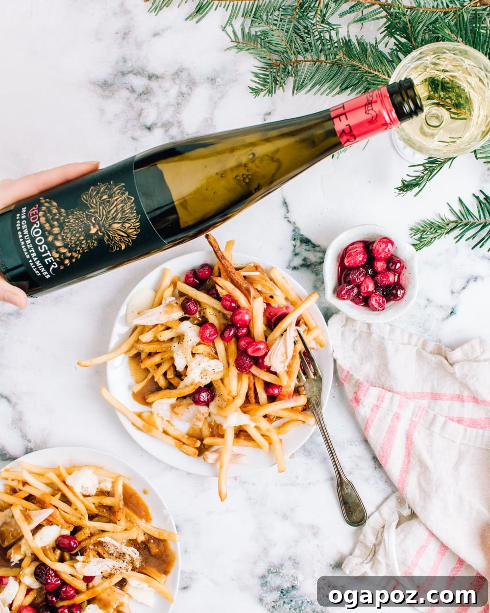 Jingle Bell Poutine 2 Delicious Christmas Poutine with fries, turkey, gravy, cheese, and cranberry sauce