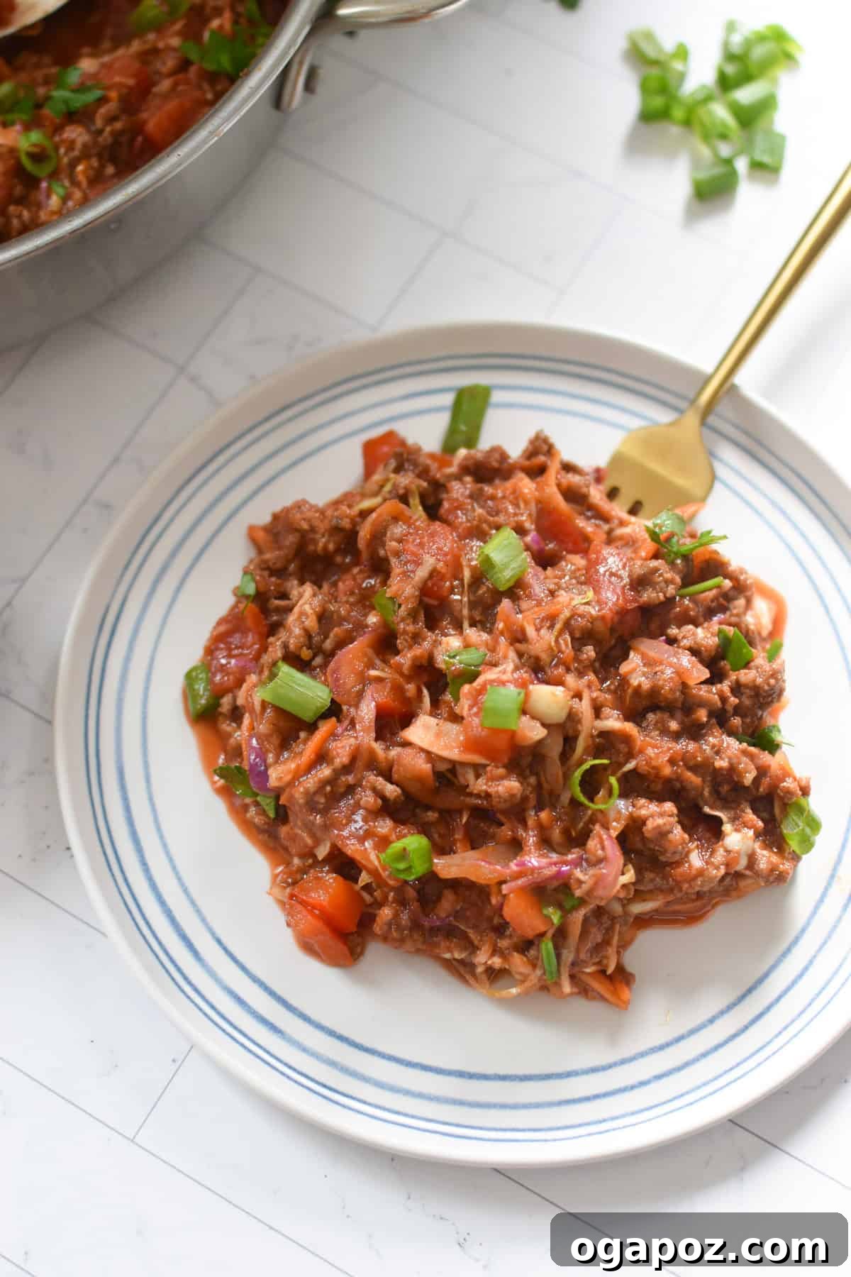 Rustic Mediterranean Beef and Cabbage Stir-fry 6 A serving of Mediterranean Beef and Cabbage Stir-fry on a white plate, ready to be enjoyed.