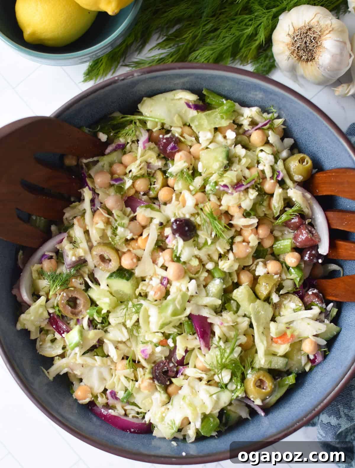 Zesty Greek Cabbage Slaw 10 A rustic bowl brimming with Lahanosalata, Greek cabbage salad, garnished with fresh herbs and feta.