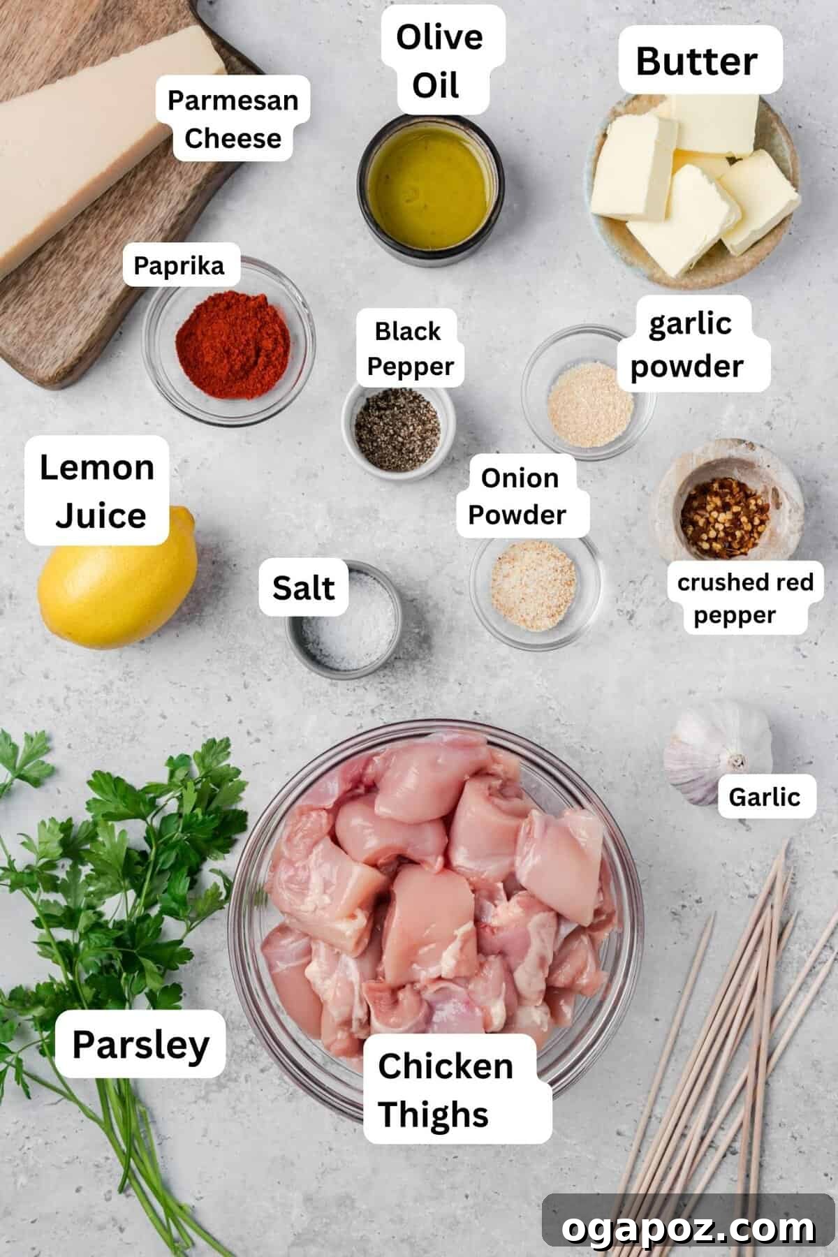 Golden Garlic Parmesan Chicken Skewers 5 Grilled Chicken Skewers with fresh recipe ingredients laid out.