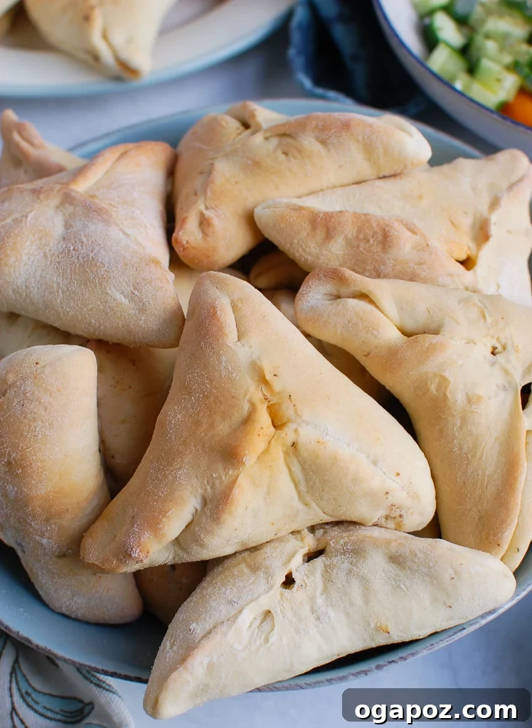 A large bowl of Lebanese Meat Pies (Sfeehas)