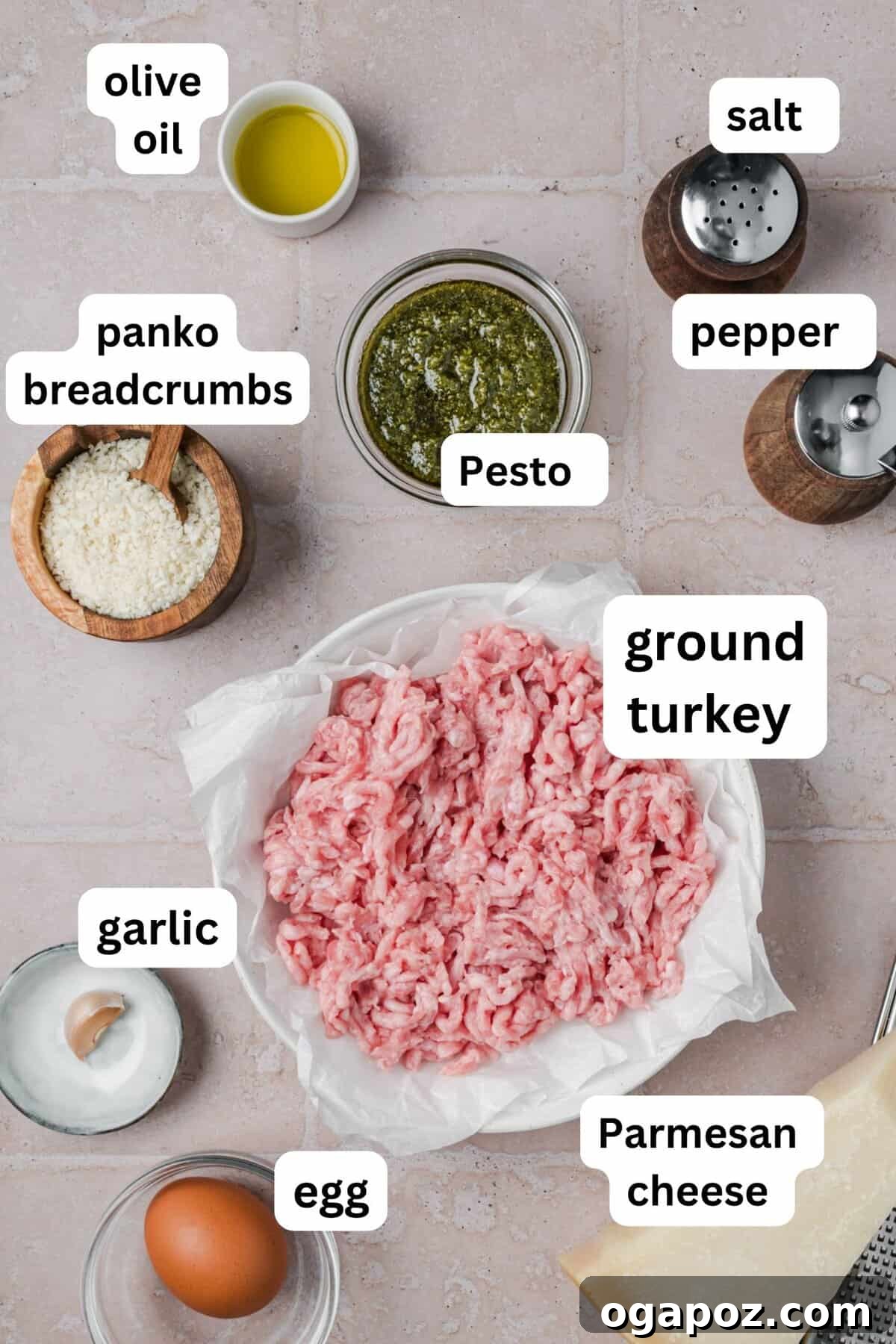 Emerald Pesto Turkey Bites 4 A selection of fresh, high-quality ingredients laid out for making easy Turkey Pesto Meatballs, including ground turkey, pesto, Parmesan, and breadcrumbs.