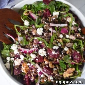Lentil and Beet Salad in a white bowl, ready to serve.