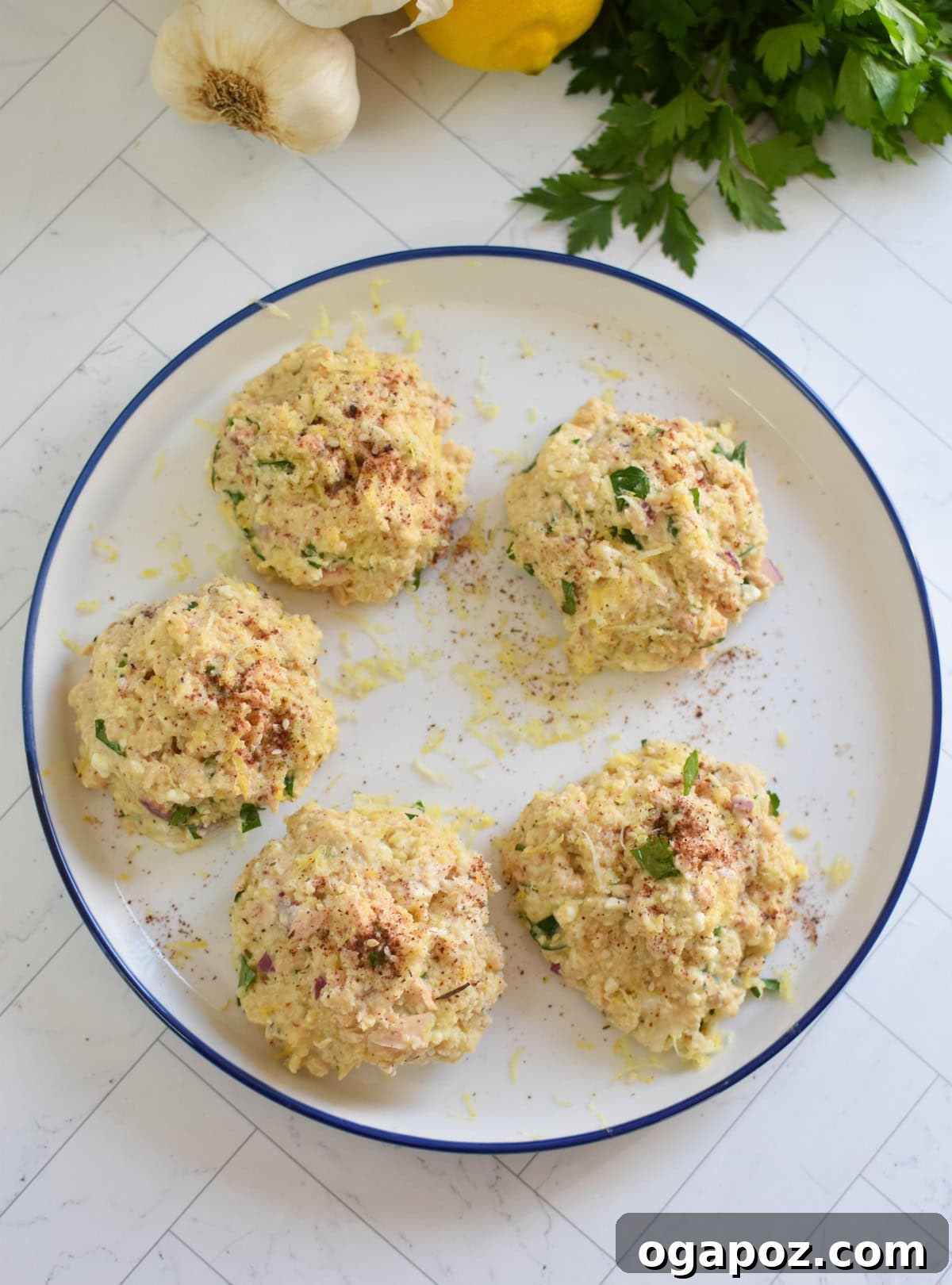 Mediterranean Salmon Patties formed on a plate 