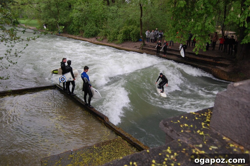 Munich: A Bavarian Jewel 17 Thrilling shot of a river surfer expertly riding a standing wave on the Eisbach in Munich's Englischer Garten