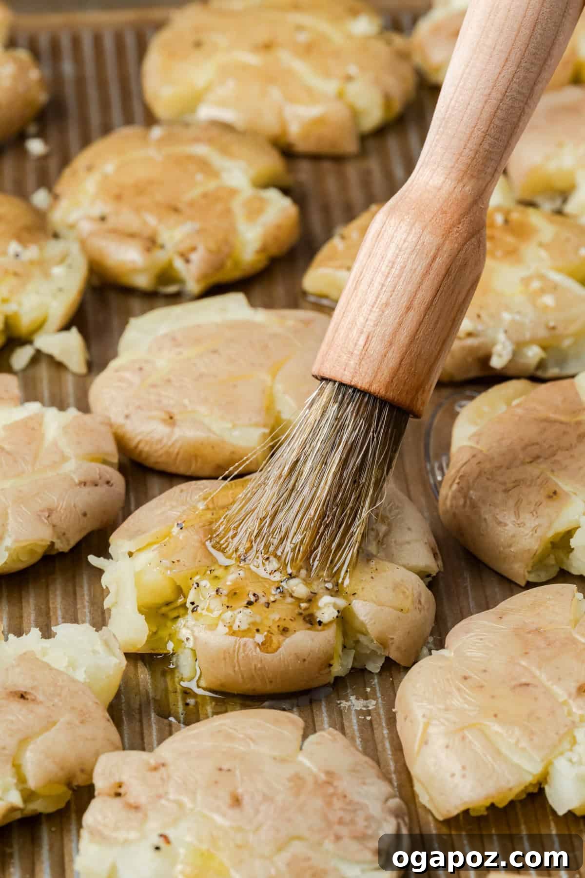 Crispy Garlic Parmesan Smashed Potatoes 11 Smashed potatoes brushed with a garlic butter mixture.