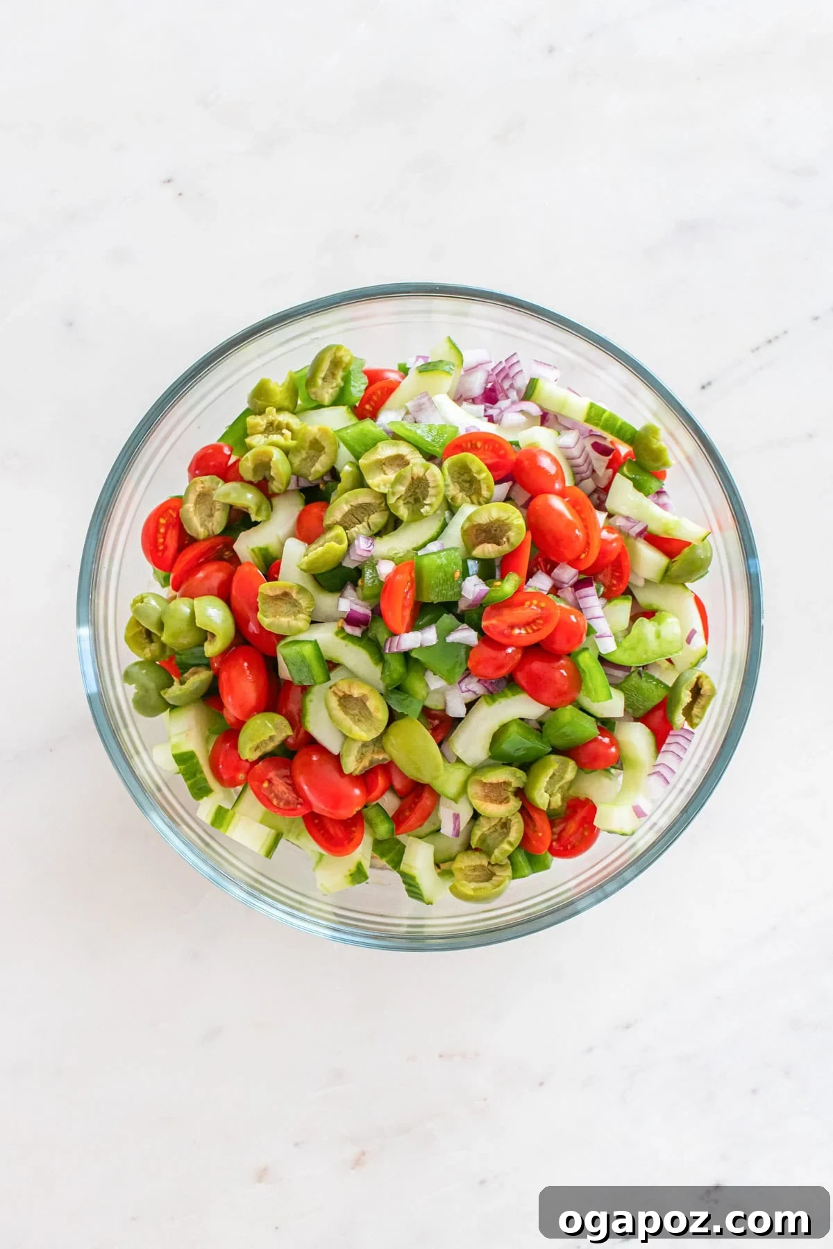 Zesty Greek Butter Bean Salad 9 Chopped vegetables added to the bowl with butter beans and dressing