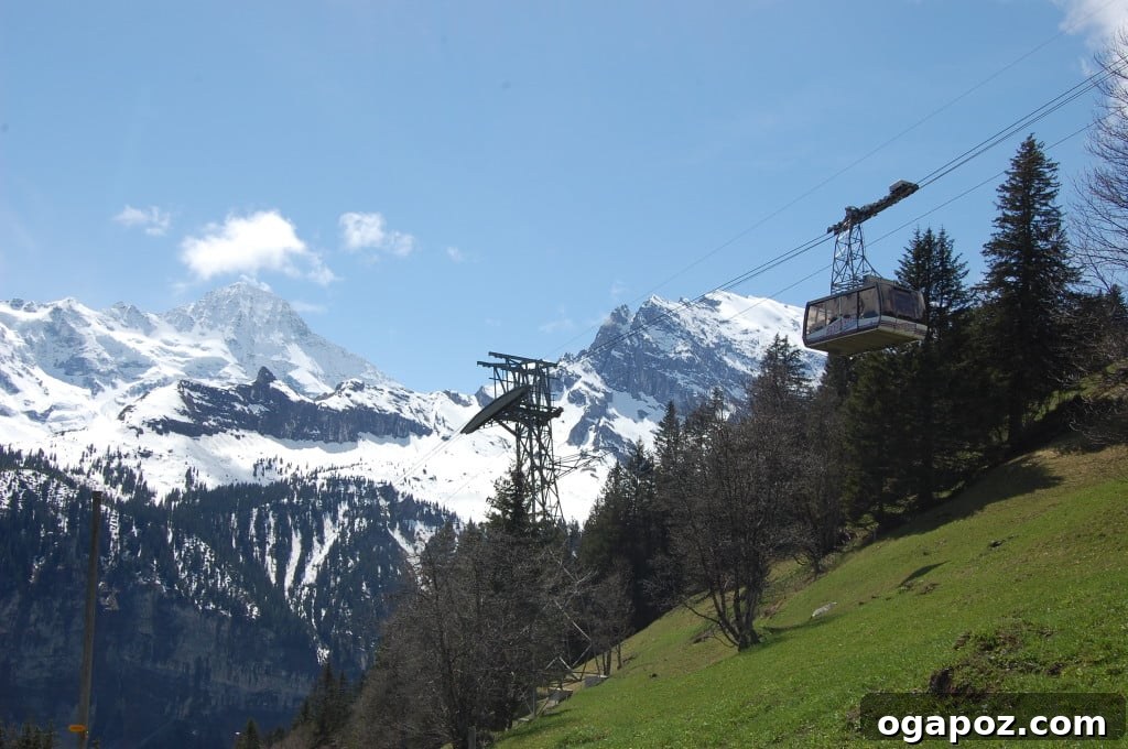 Interlaken Swiss Adventure Hub 12 Another view of a cable car with majestic mountain scenery