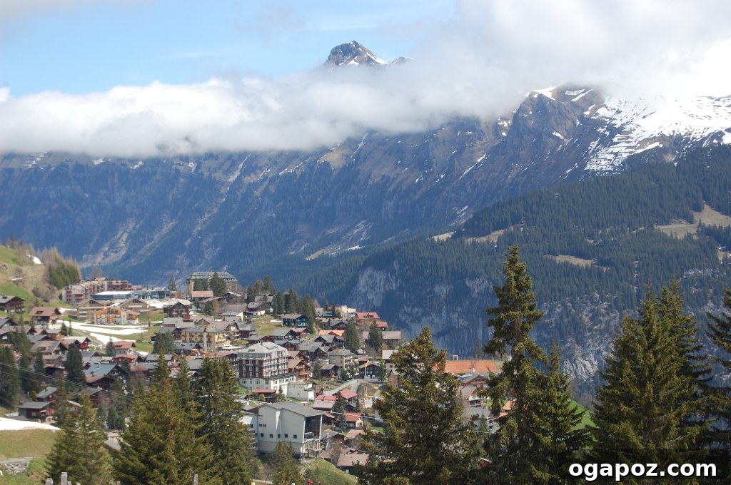 Interlaken Swiss Adventure Hub 19 Charming buildings in Murren with mountainous background