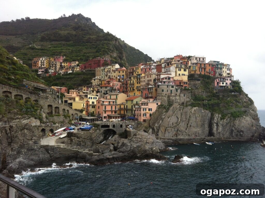 Italy's Coastal Charms: Cinque Terre and Santa Margherita 2 Panoramic view of colorful cliffside villages in Cinque Terre, Italy