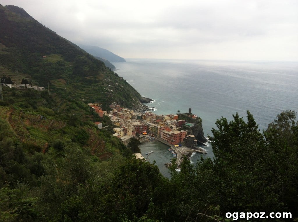 Italy's Coastal Charms: Cinque Terre and Santa Margherita 9 Stunning view of one of the colorful villages of Cinque Terre nestled against the coastline