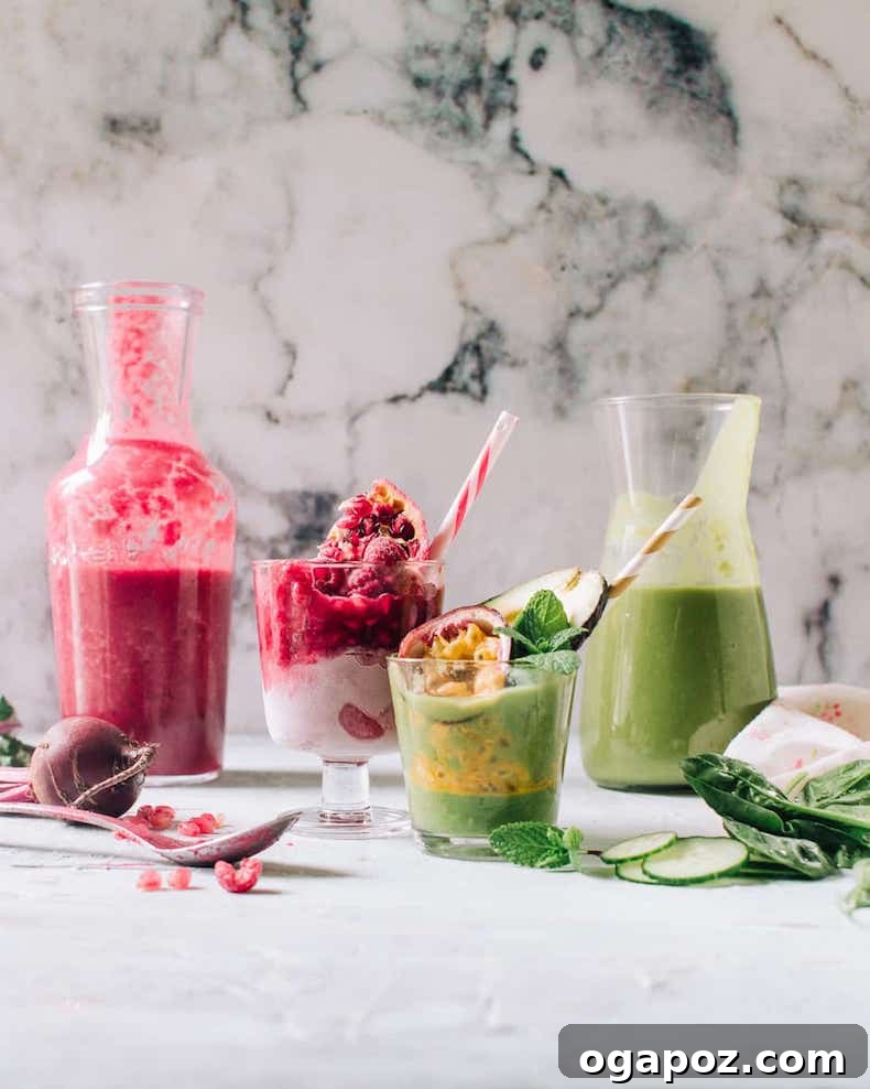 Transform Your Health: 25+ Irresistible Smoothie Creations 17 A jar and glass of green avocado smoothie beside a pink smoothie on a table