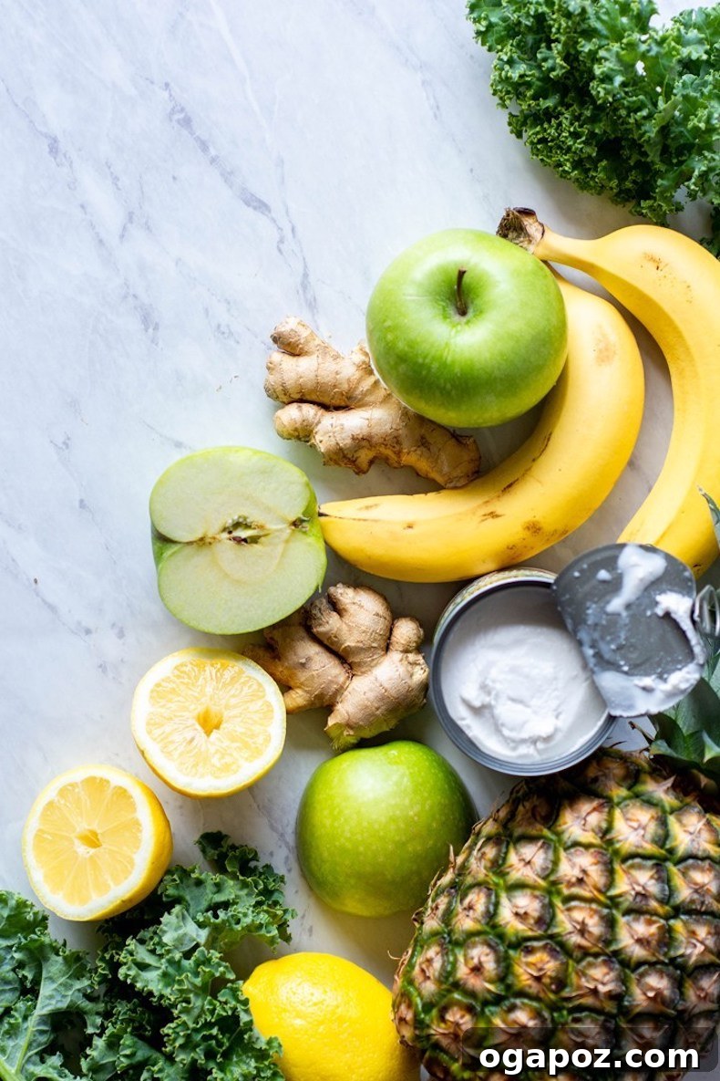 Transform Your Health: 25+ Irresistible Smoothie Creations 19 Green apple, ginger, lemon, banana, and pineapple on a marble backdrop