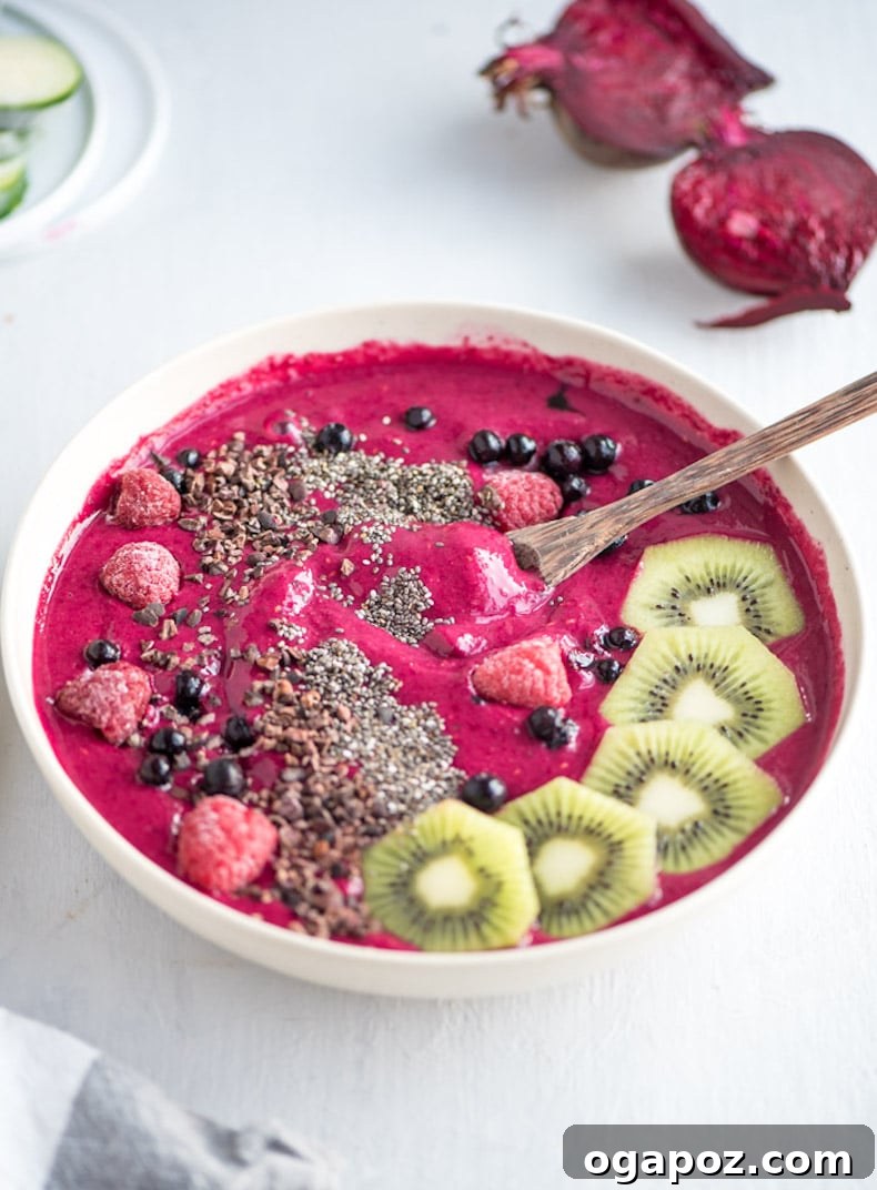 Transform Your Health: 25+ Irresistible Smoothie Creations 8 Strawberry beet smoothie bowl topped with kiwi slices