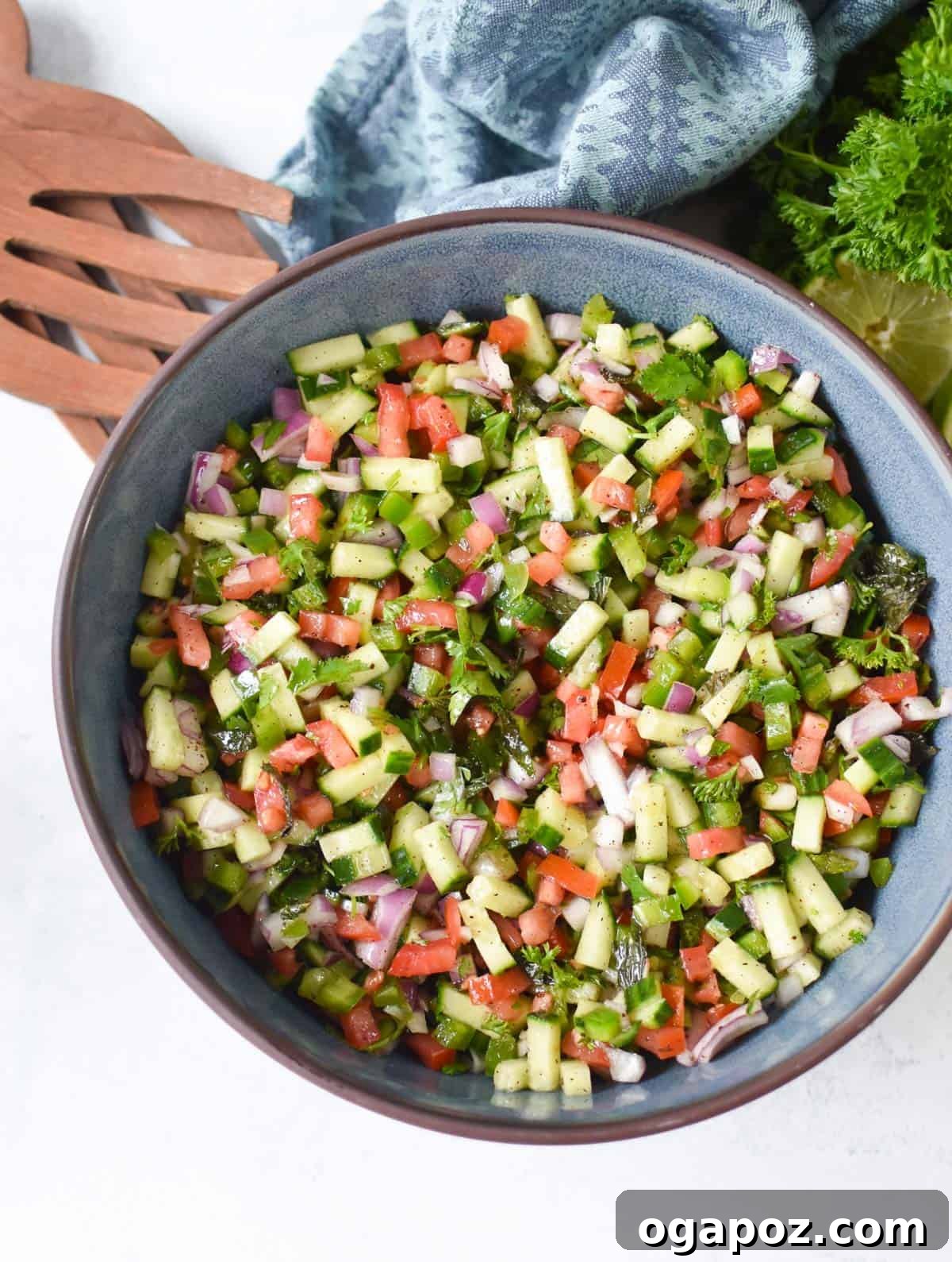 Authentic Shirazi Salad Recipe 11 Shirazi Salad Recipe with wooden serving spoons