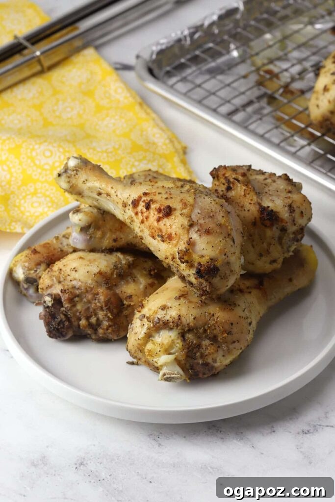 41 Delicious Chicken Drumstick Recipes: Simple and Super Juicy 19 Lemon Pepper Chicken Drumsticks served in a large plate