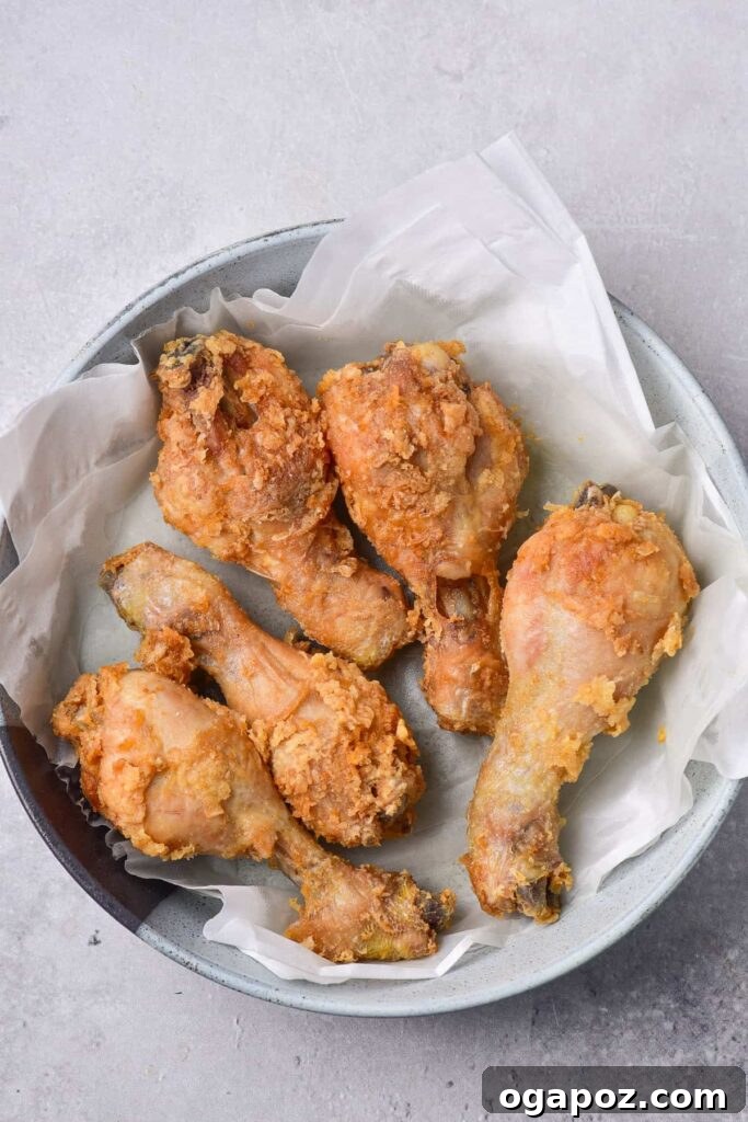 41 Delicious Chicken Drumstick Recipes: Simple and Super Juicy 21 Deep Fried Chicken Drumsticks placed on a plate