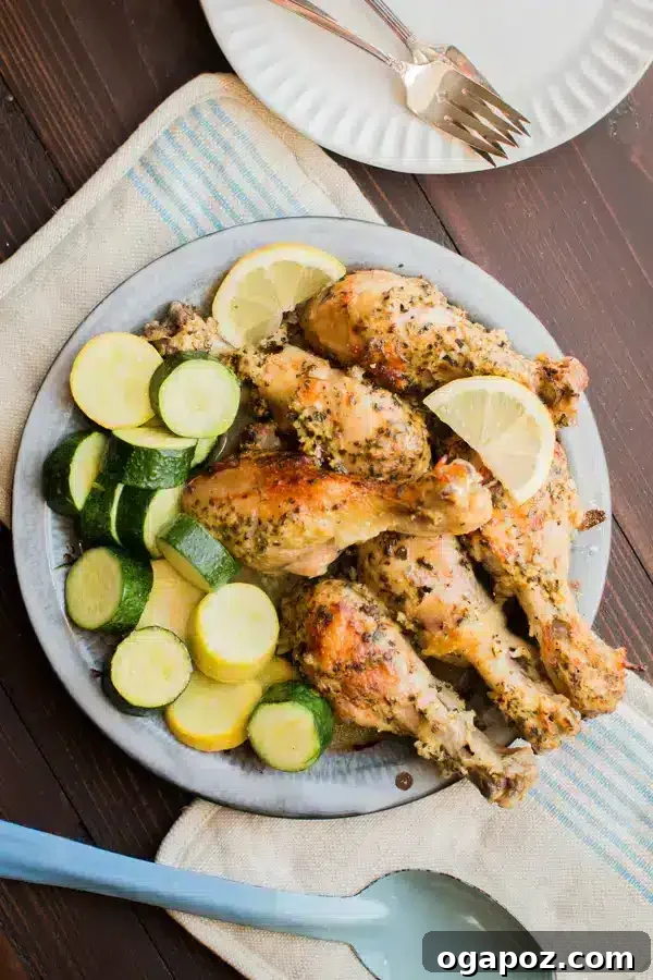 41 Delicious Chicken Drumstick Recipes: Simple and Super Juicy 30 Slow Cooker Greek Chicken Drumsticks served with sliced zucchini