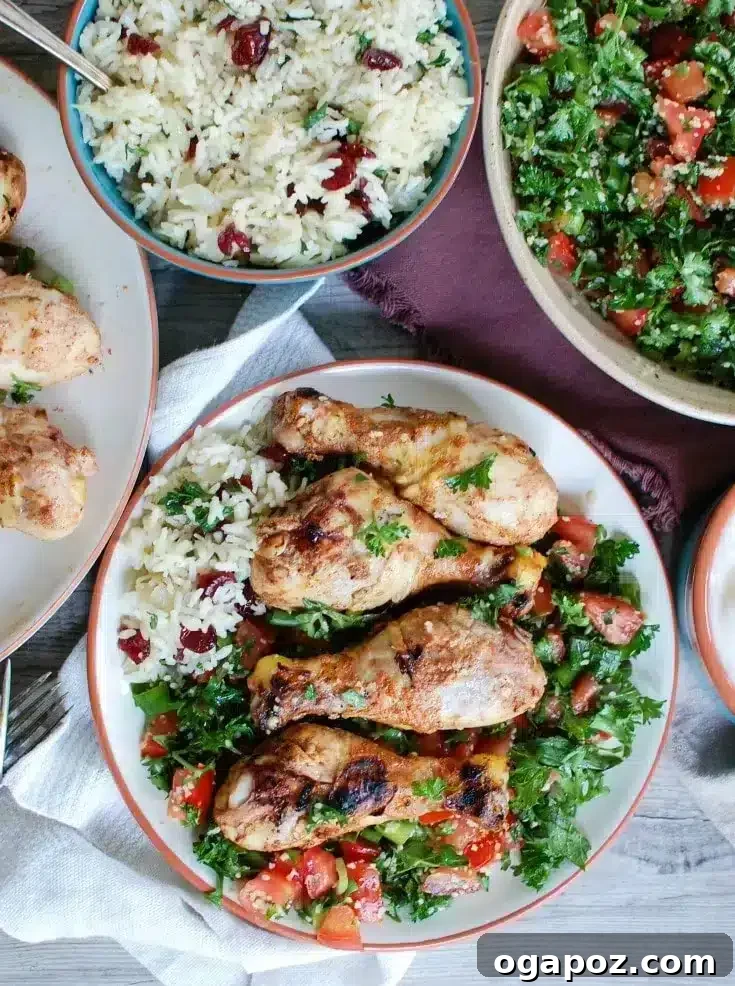 41 Delicious Chicken Drumstick Recipes: Simple and Super Juicy 38 Mediterranean Chicken Drumsticks served with rice and salad